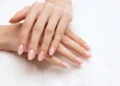 Girls hands beautiful pale pink 600nw 2210046363